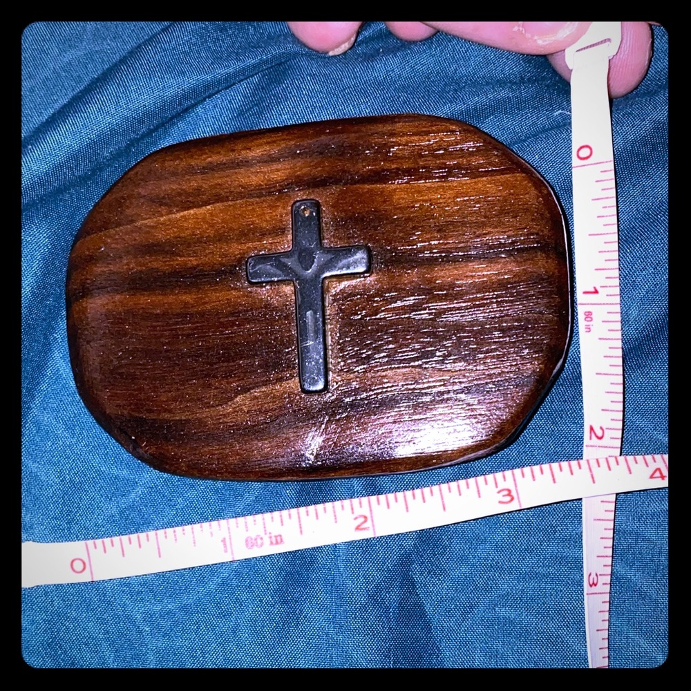 Handmade wood belt buckle with a grey cross